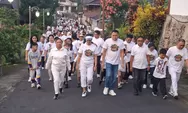 Semarak HUT Wanua Lowu ke-343, Bupati Ronald Kandoli dan Ketua TP PKK Pimpin Jalan Sehat Bersama Warga