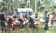 Babinsa-Masyarakat gotong-royong bangun rumah masyarakat