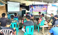 TNI Dan Masyarakat Di Lirung Bersatu Dalam Semangat Kebangsaan Melalui Nobar Piala Dunia 2026