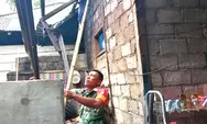 Wujud Kemanunggalan TNI, Babinsa Koramil 1312-02/Lirung Gotong royong Rehab Dapur Warga Kurang Mampu