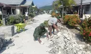 Anggota TNI, Pemerintah Desa dan Warga Pasang Paving Blok Pembuatan Jalan Desa Tabang