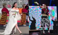 Mengintip gaya Agnez Mo di MotoGP Mandalika 2026, tampil anggun dengan gaun putih: Suaranya getarkan hati saat nyanyikan Indonesia Raya