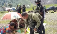 Patroli Humanis Satgas Ops Damai Cartenz Sambangi Pedagang dan Tukang Ojek di Mulia