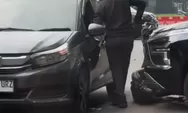 Viral! Gerak-gerik Dua Pria di Parkiran GBK Diduga Gesek Nomor Rangka Mobil