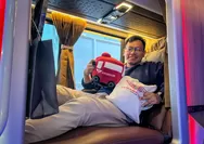 Peringati Hari Pelanggan Nasional, Gilang Widya Pramana Juragan 99 Bagikan Souvenir ke Penumpang Bus AKAP Juragan 99 Trans Jurusan Jakarta - Malang