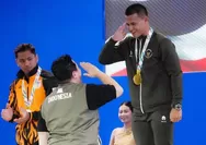 Kembali Raih Emas, Rizki Juniansyah Pecahkan Rekor Asia dan Dunia di SEA Games 2025