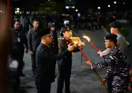 Peringati HUT ke-81 RI, Pemkab dan Polres Karimun Gelar Upacara Taptu dan Pawai Obor