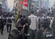 BNN gerebek Kampung Bahari, Tanjung Priok, dan tangkap bandar narkoba. Loyalis diduga melawan hingga petugas menembakkan gas air mata.