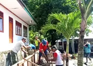 Babinsa Serka Florianus Bersama Masyarakat Melaksanakan Kerja Bakti Di SDK Sion Marampit