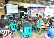 TNI Dan Masyarakat Di Lirung Bersatu Dalam Semangat Kebangsaan Melalui Nobar Piala Dunia 2026