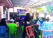 TNI dan Masyarakat Semarakkan Nobar Gembira Piala Dunia 2026 di Beo, Pererat Kemanunggalan TNI-Rakyat