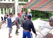 Babinsa Koramil 06 Nanusa bersama masyarakat melaksanakan kerja bakti di gedung gereja.