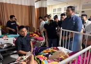 Beri Dukungan Moril, Wali Kota Kotamobagu Weny Gaib dan Ketua Tidar Sulut Jenguk Korban Drag Race di RSUP Kandou