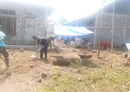 Satgas TMMD Bersama Masyarakat Rapikan Galian dan Ratakan Tanah di Desa Bantik