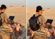 Cowok Ini Terekam Lagi Kerja Pakai Laptop saat Naik Unta di Gurun Sahara, Definisi WFA Sesungguhnya!