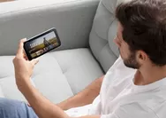 Link s.id/abedev217 BitTV 2.1.7 Obsidian Sfile Mobi Terbaru, simak fitur nonton TV, bola, risiko APK, dan alternatif aman.