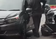 Viral! Gerak-gerik Dua Pria di Parkiran GBK Diduga Gesek Nomor Rangka Mobil
