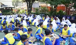 Bhayangkari Korps Brimob Polri Bagikan Makan Bergizi Gratis untuk Ribuan Siswa di Depok