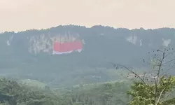 Kabupaten Bogor Pecahkan Rekor MURI, Bendera Merah Putih Raksasa Berkibar di Tebing Jeger Klapanunggal