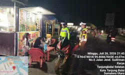 Sat Lantas Polres Tanjung Balai Gelar Patroli "Polantas Menyapa" Pedagang