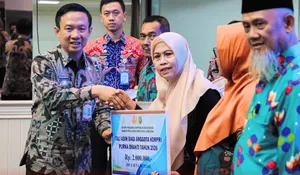 Pemprov Lampung Serahkan Tali Asih, Santunan, dan Penghargaan Korpri