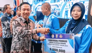 Lampung Siap Jadi Tuan Rumah Pornas Korpri 2027, Sekda Serahkan Tali Asih Atlet Berprestasi