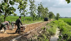 Kejar Target Cor 1.100 Meter, Satgas TMMD Sragen Hadapi Tantangan Cuaca