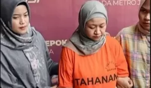 Penampakan Meita Irianty Tersangka Penganiayaan Anak Sekaligus Pemilik Daycare Depok, Kini Berbaju Tahanan dengan Wajah Murung 