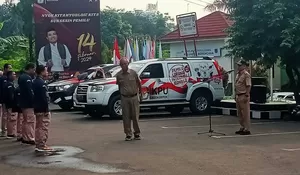 Aparatur Kecamatan Tapos Sukseskan Kirab Pemilu, Sosialisasikan Pemilu kepada Warga