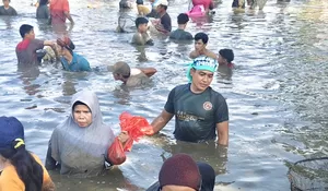 Ngubek Empang Ala Lebaran Depok : Awalnya Bukan Warga yang Nyari Ikan, Tapi Ini Dia Orang-Orangnya