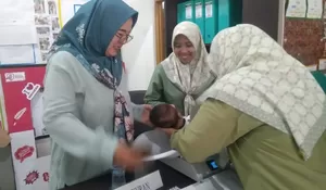 Mengikuti Pemberian Obat Cacing di Posyandu Kangkung RW2 Pondok Cina Depok : Siapkan Generasi Emas Bebas Cacingan