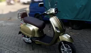 Biar Nggak Boncos, Ini Hal yang Harus Diperhatikan Pengendara Motor Listrik saat Musim Hujan