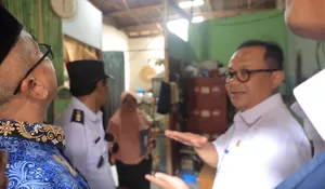 Pj Wali Kota Bekasi Salurkan Bantuan Perbaikan RTLH dari KORPRI buat Warga Jatiwaringin