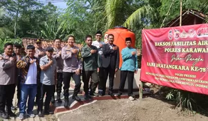 HUT Bhayangkara Ke-78, Polres Karawang Bagikan Bansos dan Bangun Fasilitas Air Bersih