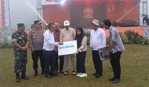 BPJS Ketenagakerjaan Cabang Bogor Cileungsi Serahkan Klaim Jaminan Kematian dan Piagam Penghargaan Kepada Kepala Desa
