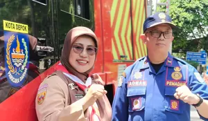 Belasan Tim Adu Ketangkasan Padamkan Api dalam Skill Competition Gabungan Kwarcab dan Damkar Kota Depok