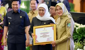 Bupati Banyuwangi Raih Penghargaan Pembina Siskamling Terpadu Merah Putih Jogo Jawa Timur Tahun 2025