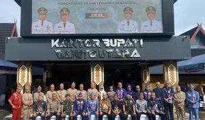 Kepala Bapas Muara Teweh Hadiri Upacara Hari Jadi Kalteng ke-69 dan Harkitnas ke-118