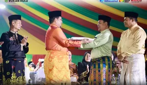 Wabup Syafruddin Poti Tegaskan Rokan Hulu Siap Jadi Tuan Rumah MTQ Riau Tahun 2027, di Kuansing Juara 1  Pawai Ta'aruf dan Stand Bazar