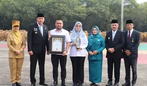 Lautan Prestasi Mengguncang Bekasi: Tri Adhianto dan Abdul Harris Bobihoe Anugerahi Para Pahlawan Pembangunan