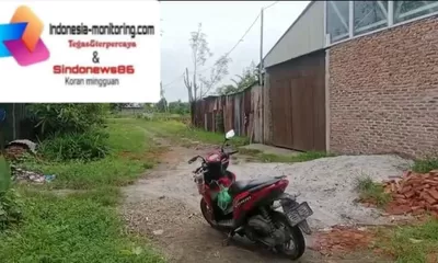 Desa Sampali jadi sarang bangunan Ilegal, Pabrik Meubel di lahan garapan diduga tak berizin, pintu seng tinggi tutupi aktivitas.