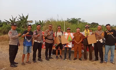 Semarak HUT RI Ke-81, Polsek Buduran Bersama Pemdes Sidokerto Gelar Lomba Layang-Layang