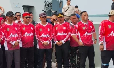Kapolres Tanjung Balai Hadiri Pengibaran Bendera Merah Putih di Perairan Bagan Asahan