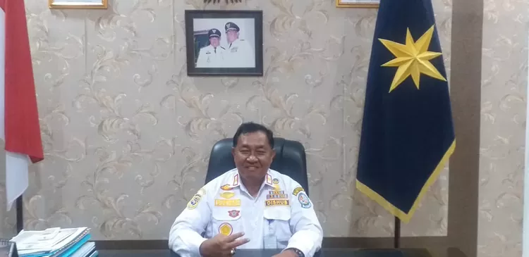 Kadis Dinas Perhubungan Deli Serdang saat menyampaikan pemberitahuan penertiban pedagang di jalan Diponogoro. Selasa, (21/10/2025).