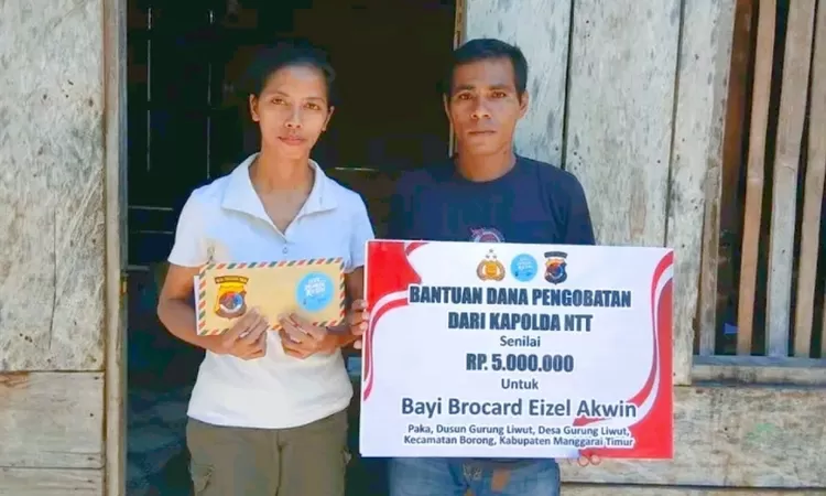 Irenius Akwin dan Elisabet Jurti, orang tua bayi penderita hidrosefalus di Matim