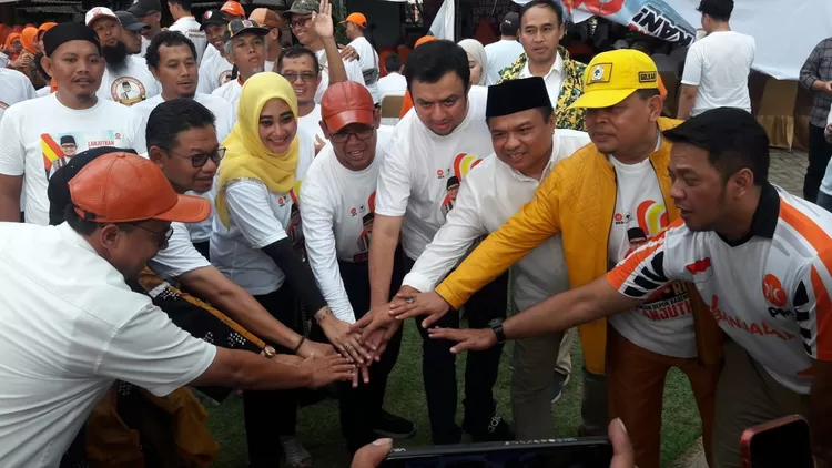 Calon Walikota dan Wakil Walikota Depok, Imam Budi Hartono dan Ririn Farabi Arafiq kompak menyambut Pilkada Depok