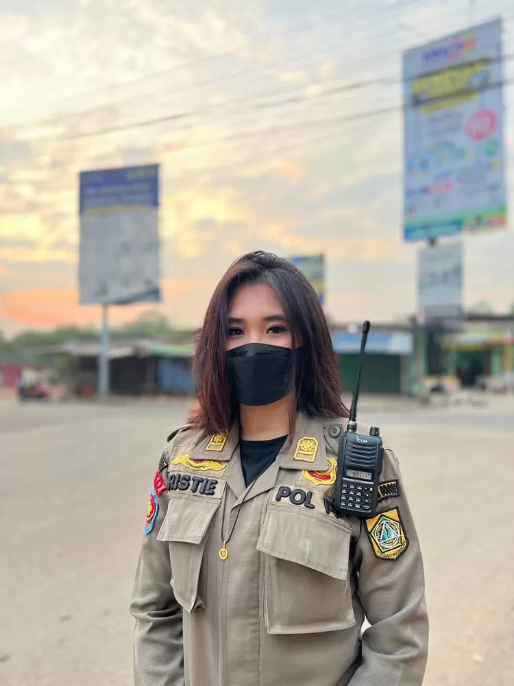 Anggota Satpol PP Kabupaten Bogor Christie Inri Makawimbang.