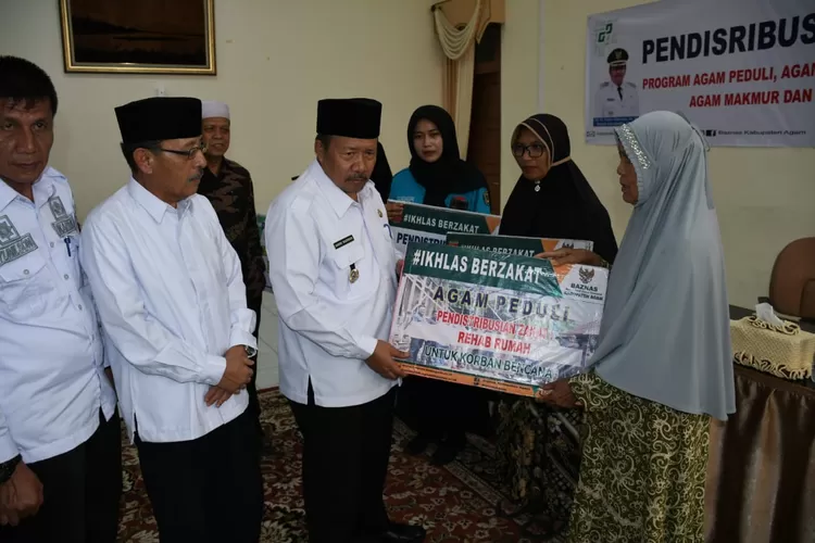 Distribusi Zakat di Kabupaten Agam: Baznas Salurkan Dana Zakat untuk 514 Mustahik (Humas Pemko Padang )