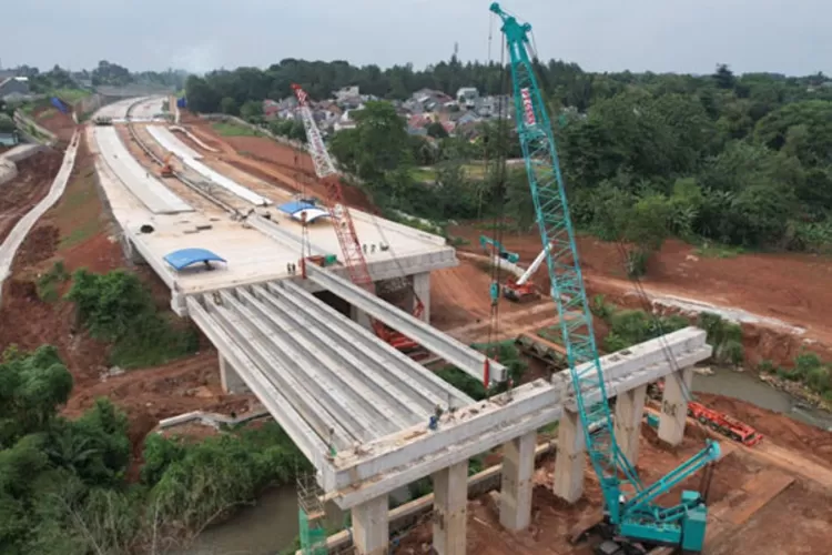 Ilustrasi pembangunan Jalan Tol Bayung Lencir-Tempino di Provinsi Jambi yang harus mundur dari jadwal. Diketahui rangkaian Jalan Tol Trans Sumatera (JTTS) ini tersandung kasus pembebasan lahan yang belum tuntas. (Dok: PT Grant Surya Multi Sarana)