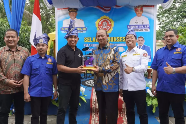 Plt Bupati Langkat H. Syah Afandin, SH menghadiri pelantikan Karang Taruna Kecamatan Tanjung Pura (Realitasonline.id/AA)